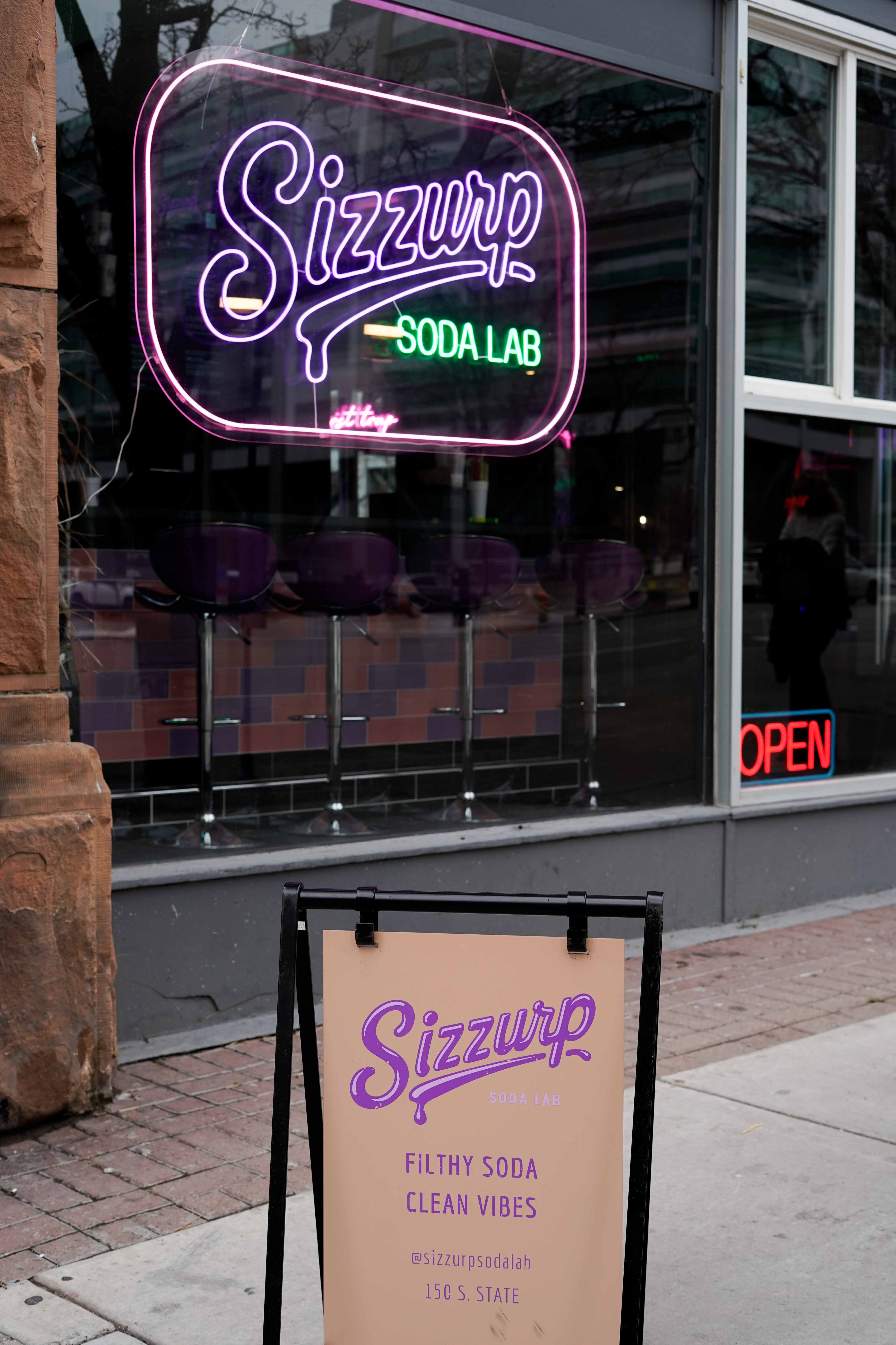 Close-up of a freshly made Sizzurp drink with fruit puree toppings