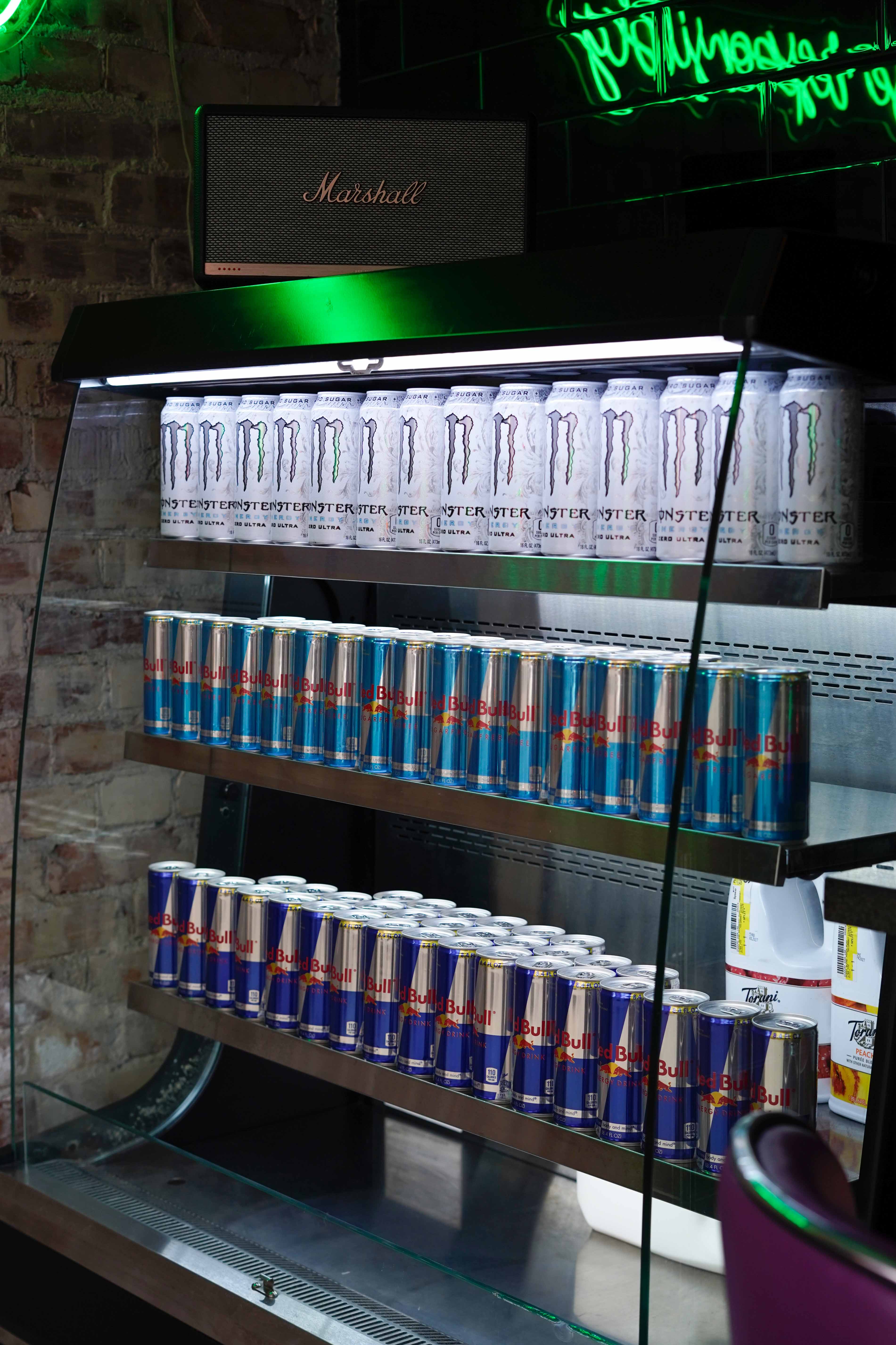 Sizzurp crew crafting a custom soda behind the counter