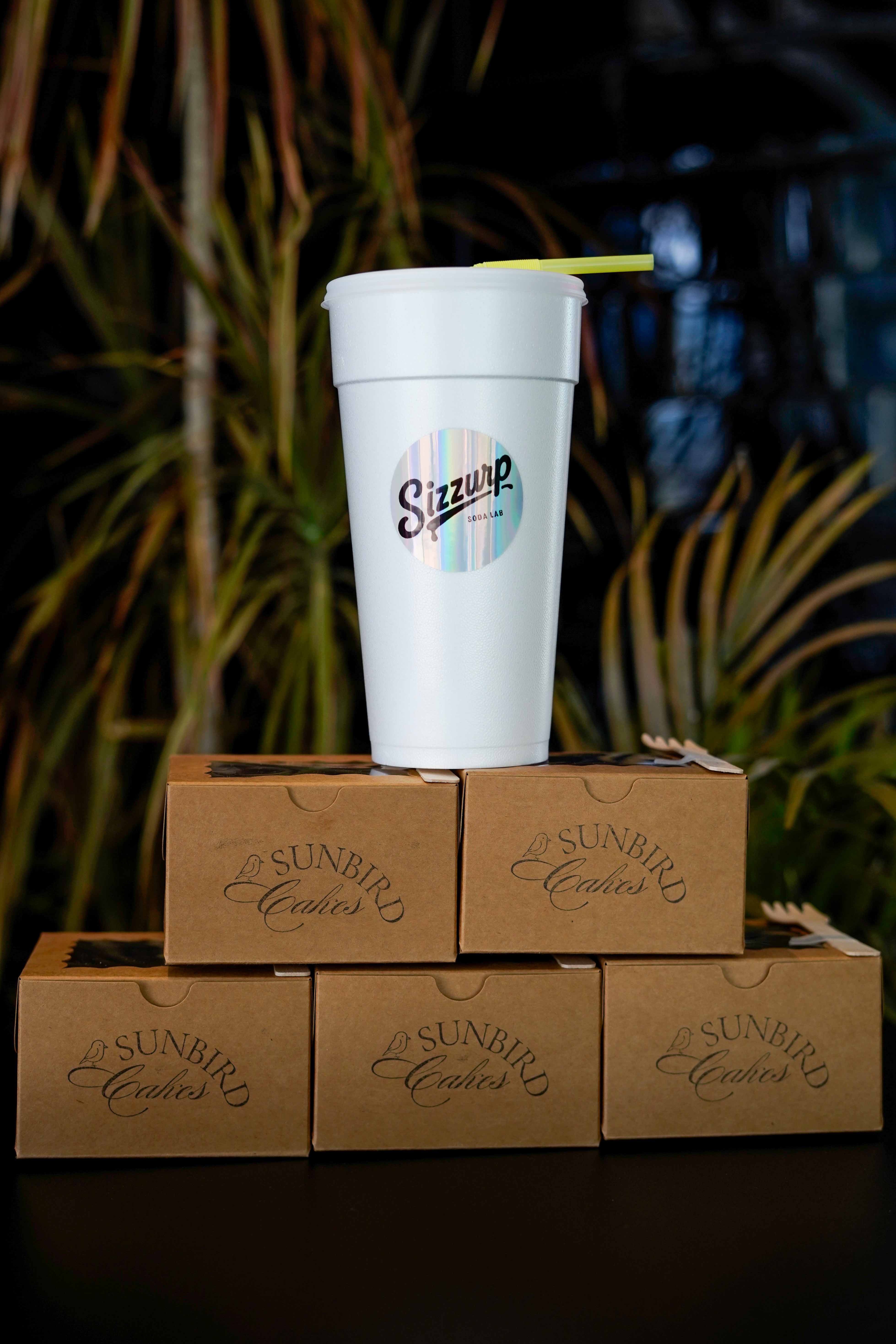 Customer enjoying a Double Dose dirty soda at Sizzurp